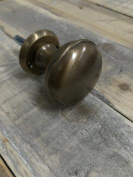 Deur knop met voetrozet, messing, is draaibaar