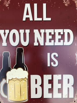 Schild mit der Aufschrift: 'ALL YOU NEED IS BEER'