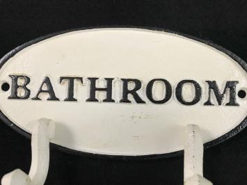 Kapstok met 2 haken, bord met opschrift: 'BATHROOM', gietijzer