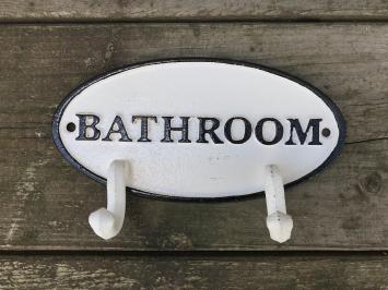 Kapstok met 2 haken, bord met opschrift: 'BATHROOM', gietijzer