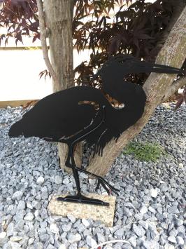 Prachtig silhouette van een reiger, mat zwart metaal