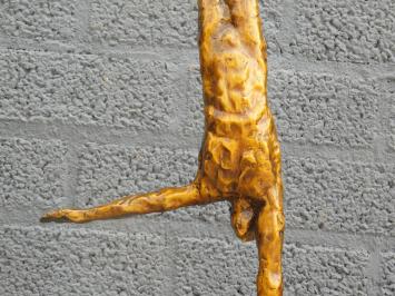 Statue eines Turners, Einarmiger Handstand